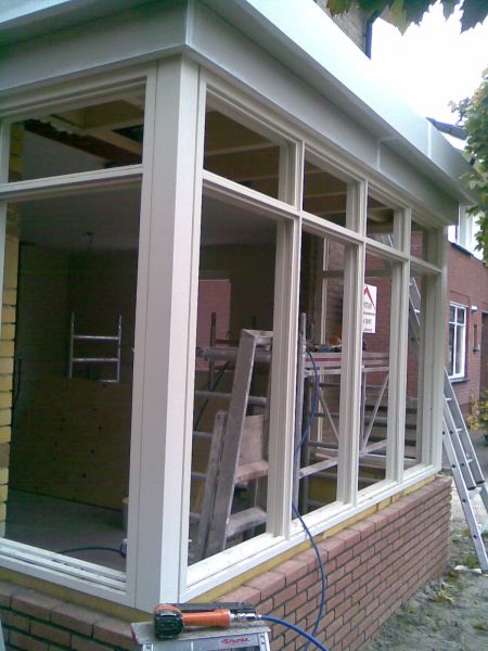 Erkers, serres braakman bouw Woonkamer zithoek erker